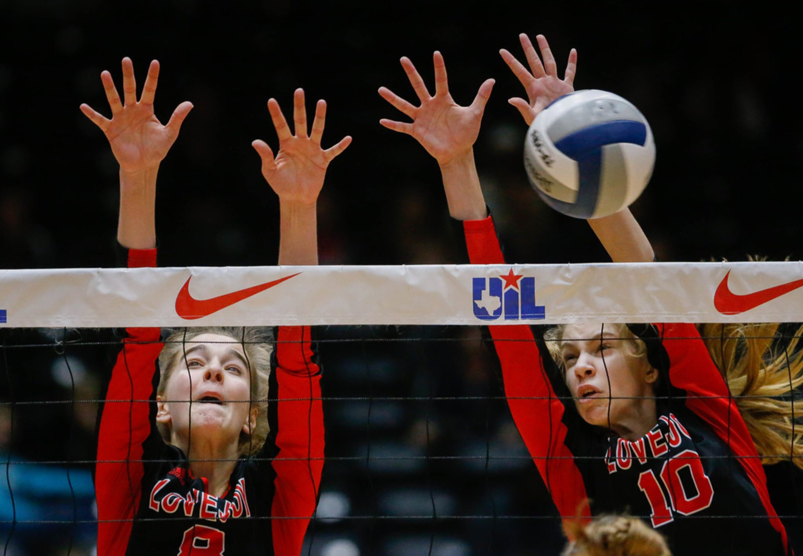 LovejoyÃs Brynn Eggar (8) and Grace Milliken (10) attempt to block a Friendswood hit during...