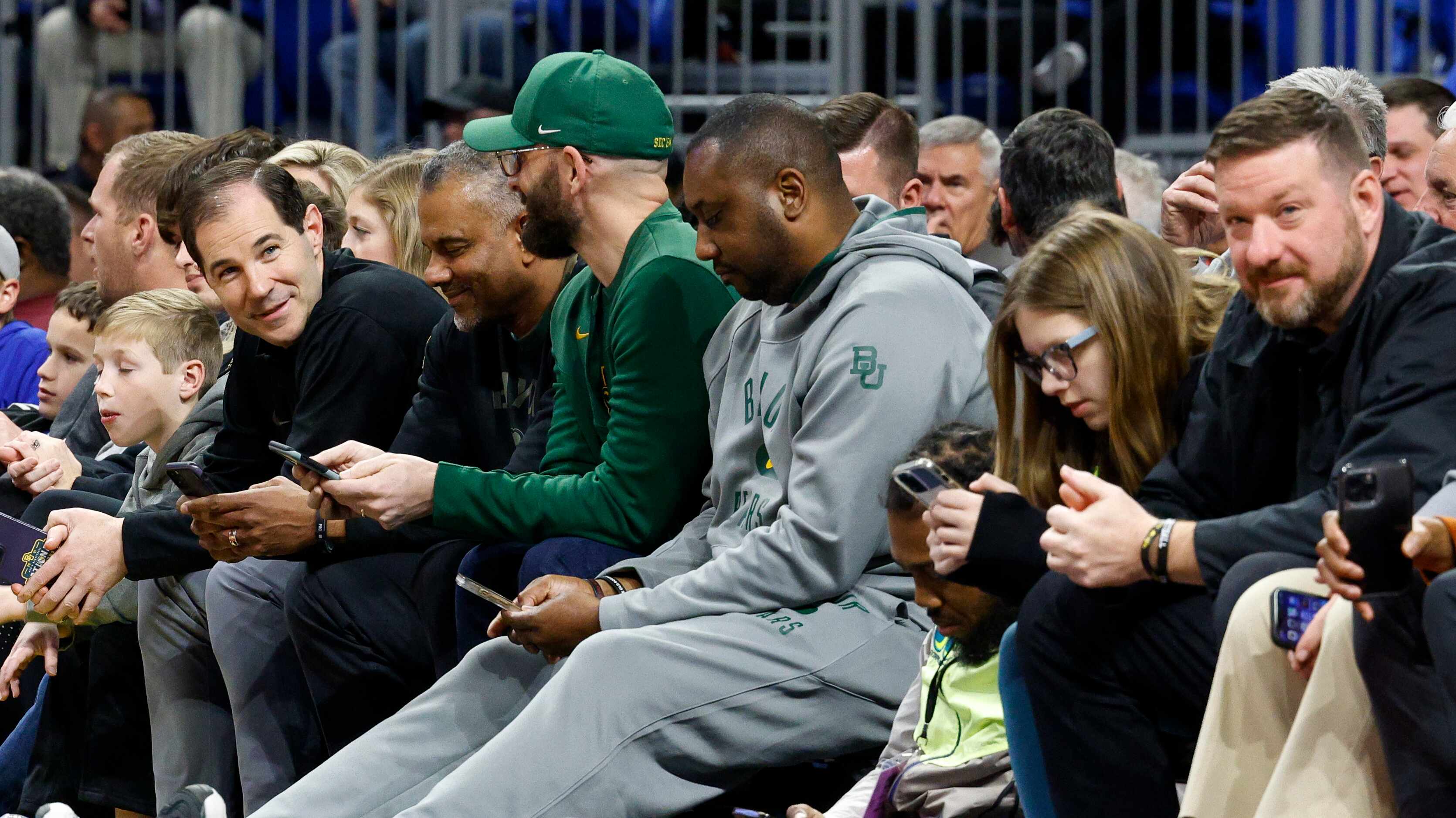 Baylor men’s basketball head coach Scott Drew (left) and Texas men’s basketball head coach...