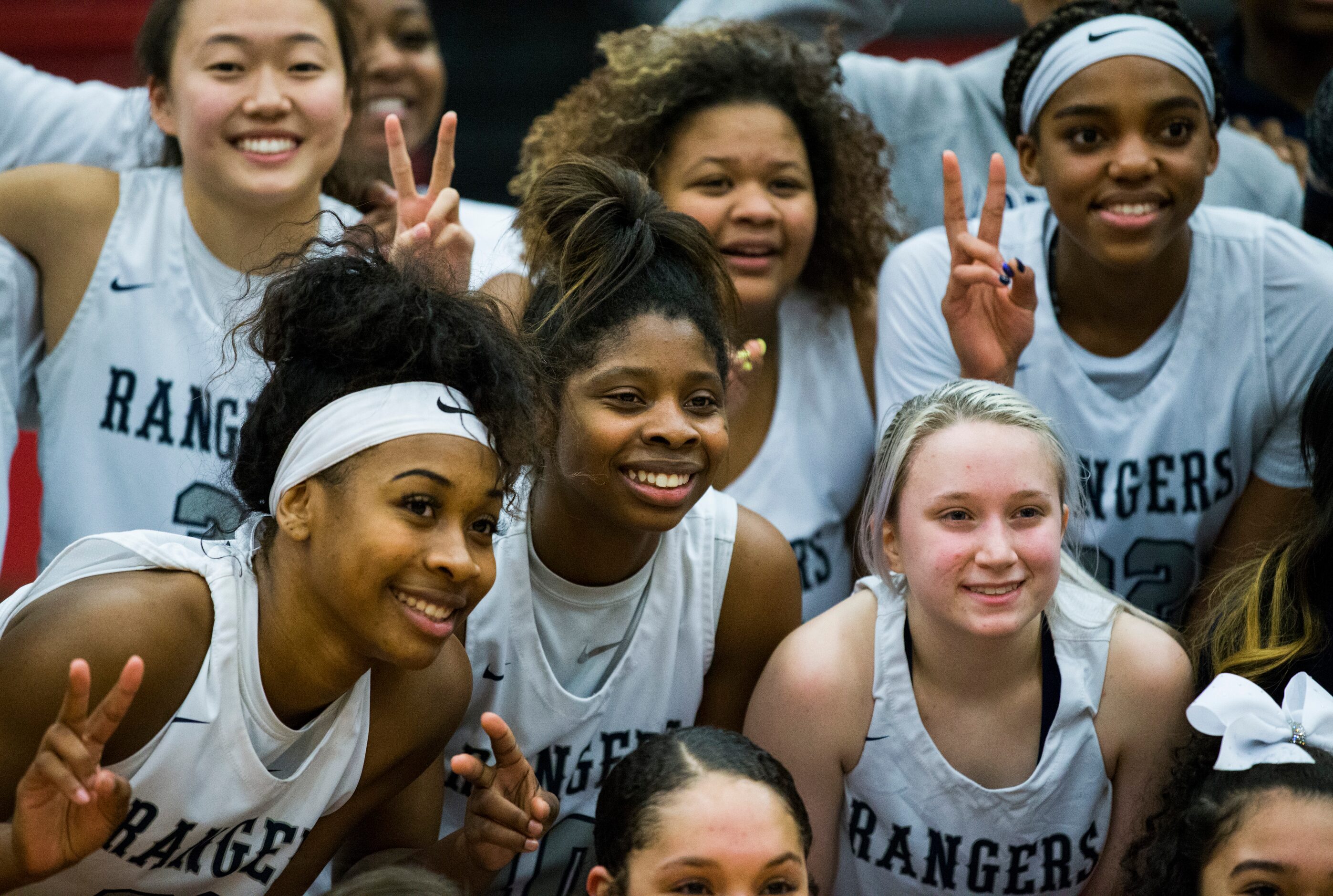 Frisco Lone Star celebrates a 46-40 win after a Class 5A area-round playoff girls basketball...