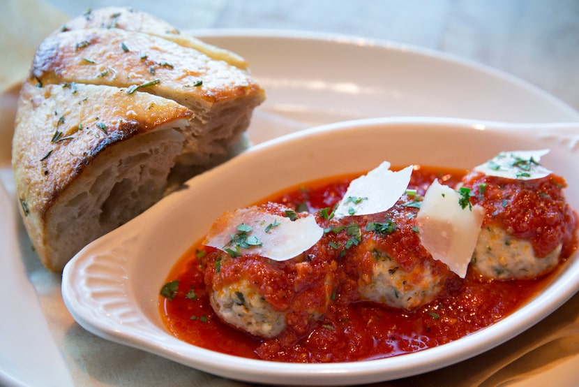 Chicken meatballs with marinara, shaved Parmesan and garlic rosemary bread