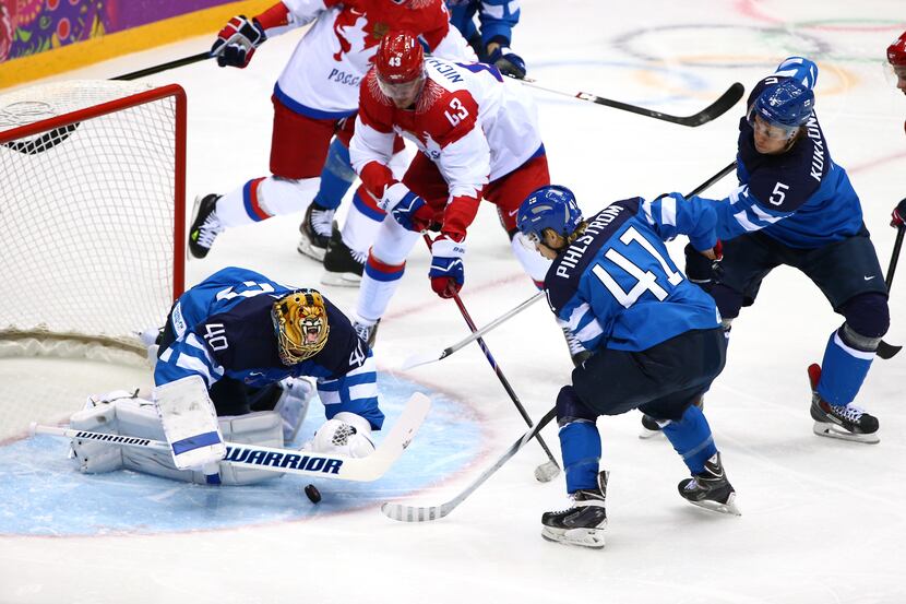 SOCHI, RUSSIA - FEBRUARY 19:  Tuukka Rask #40 of Finland makes a save against Valeri...