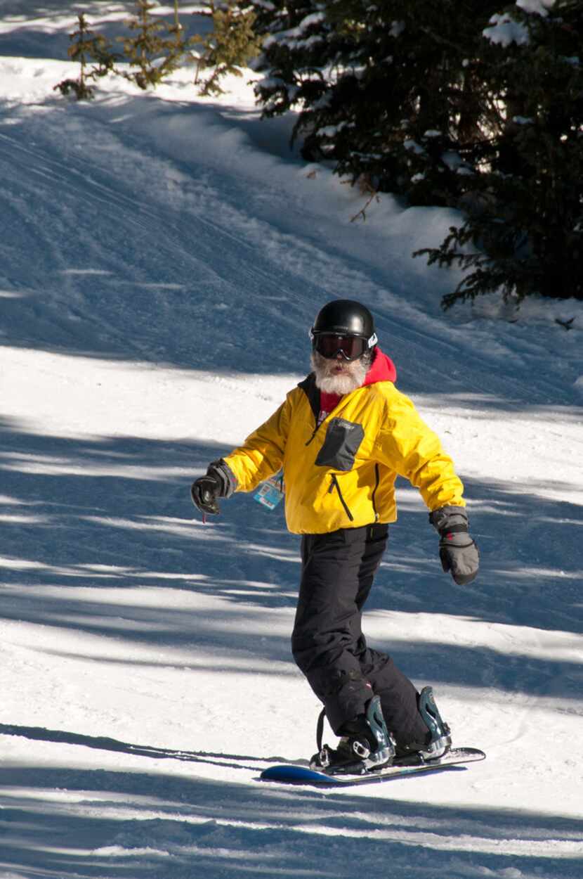 A senior rider at Ski Santa Fe shows that snowboarding isn't just for the young.  The New...