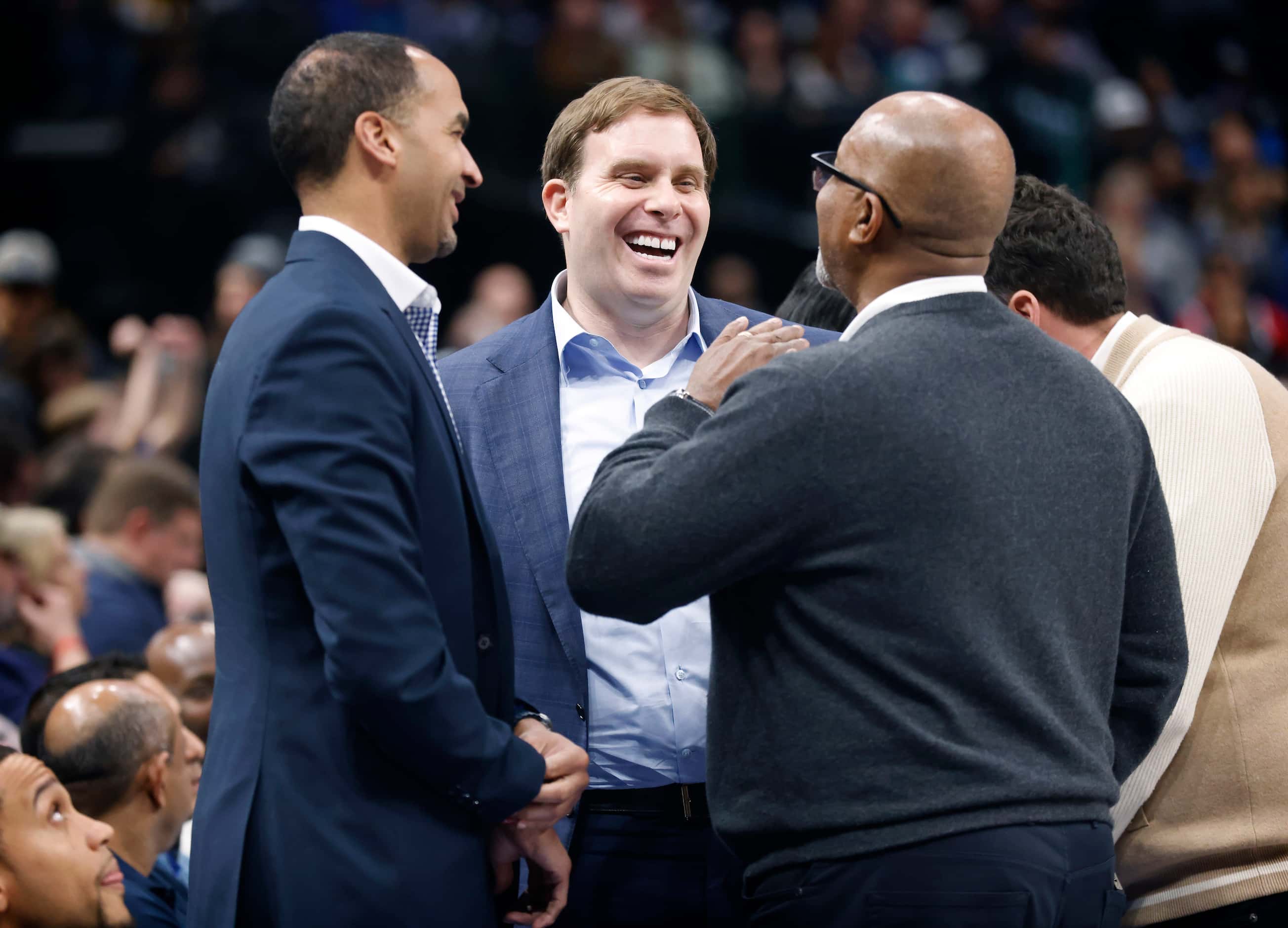 Dallas Mavericks new governor and majority owner Patrick Dumont (center) visits with former...