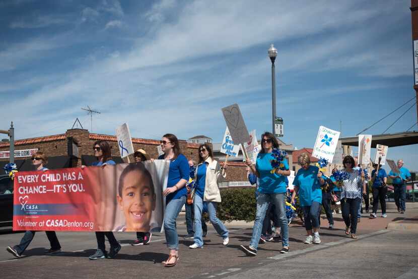  Denton, Texas 04/08/2016 Court Appointed Special Advocates marched in Denton earlier this...