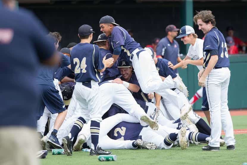 The Jesuit Rangers celebrate their win over the Humble Eagles 9-1 during the UIL State 6A...