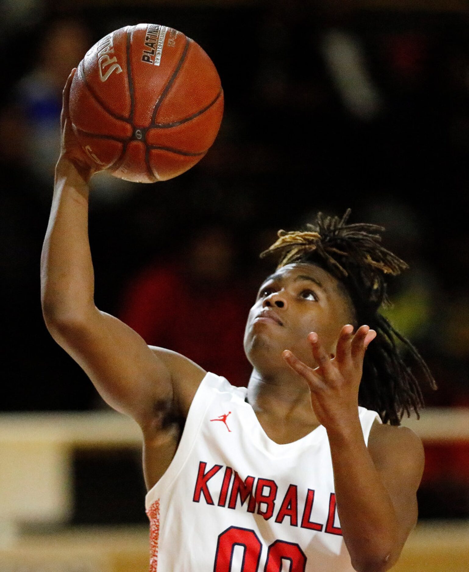 Kimball High School guard Gerald Monroe (00) shoots a lay up during the first half as...