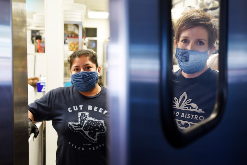 Salad chef Neydi Hernandez (left) and Erin Willis, executive chef and owner of RM 12:20...