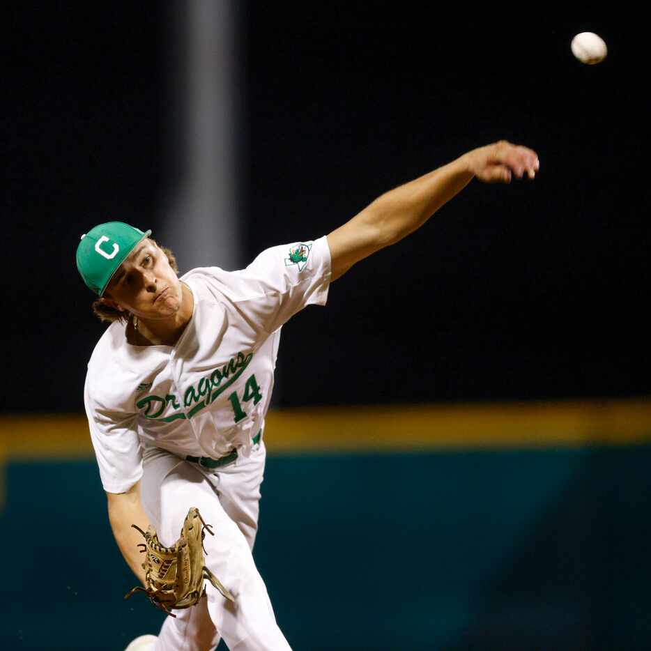 Southlake Carroll starting pitcher Griffin Herring (14) delivers a pitch during the seventh...