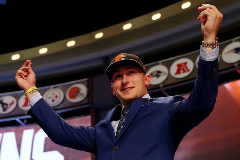 NEW YORK, NY - MAY 08:  Johnny Manziel of the Texas A&M Aggies takes the stage after he was...