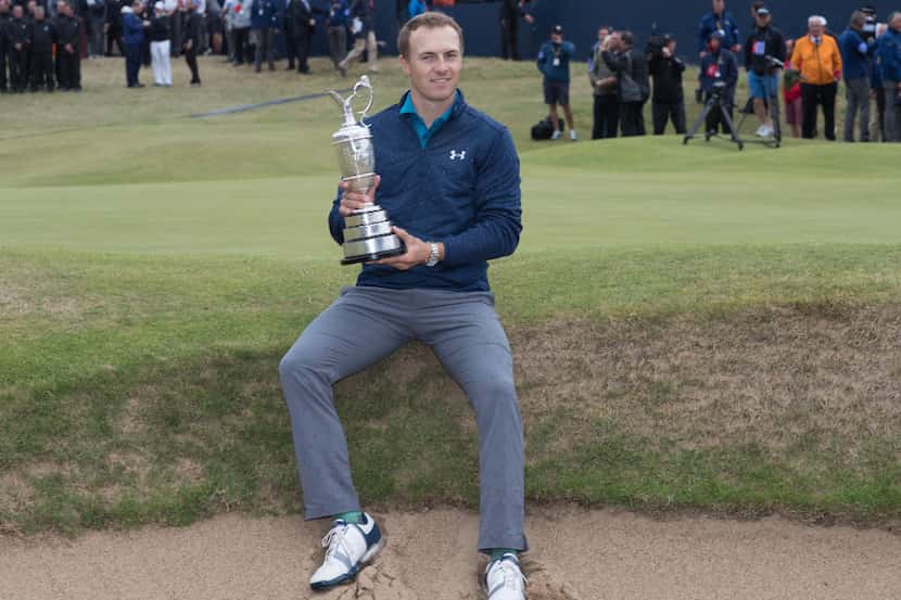 Jordan Spieth wins the Championship and receives the Claret Jug on Sunday during the final...