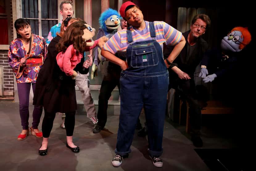 The cast of Avenue Q performs the opening number of Avenue Q on January 11, 2014 at Stage...