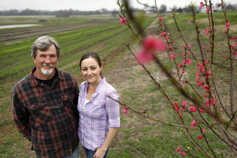 Jack and daughter Megan Neubauer on their farm, Pure Land Organic in McKinney.