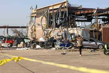 Metal framing is visible at a heavily damaged Shell gas station, on Sunday, May 26, 2024, in...
