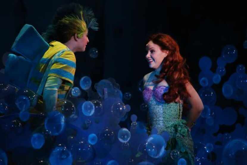 
Flounder (Shawn Platzker, left) and Ariel (Chelsea Morgan) perform a scene in Disney’s The...