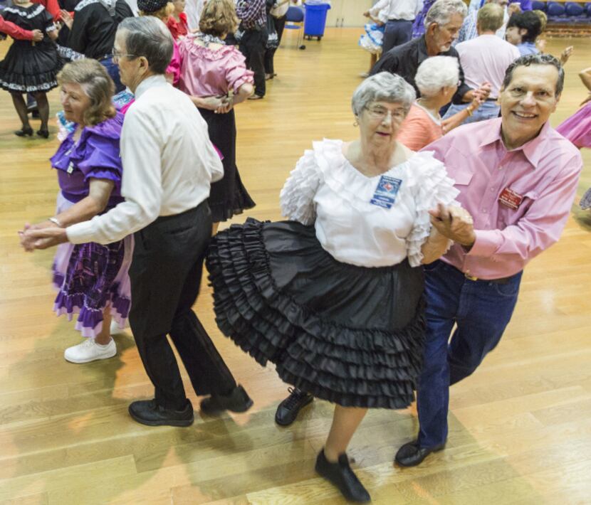 Dancers at the Dixie Chainers Square and Round Dance Club at the senior center in Farmers...