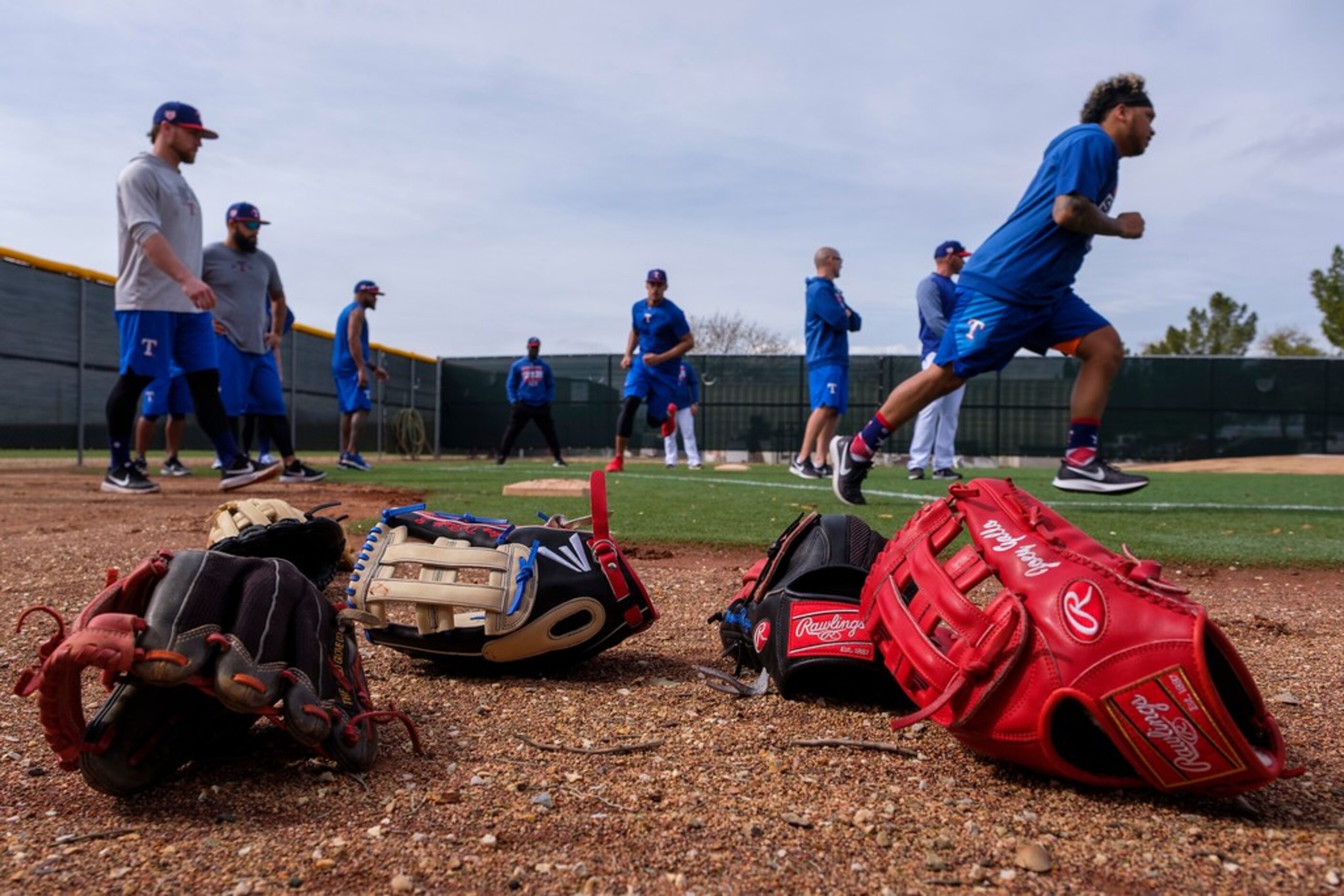 Texas Rangers outfielder Willie Calhoun (right) and infielder Patrick Wisdom (left)...