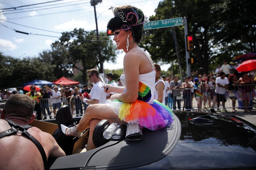 Miss Lifewalk Heidi Liqueur rides in the Alan Ross Texas Freedom Parade on Cedar Springs Rd....