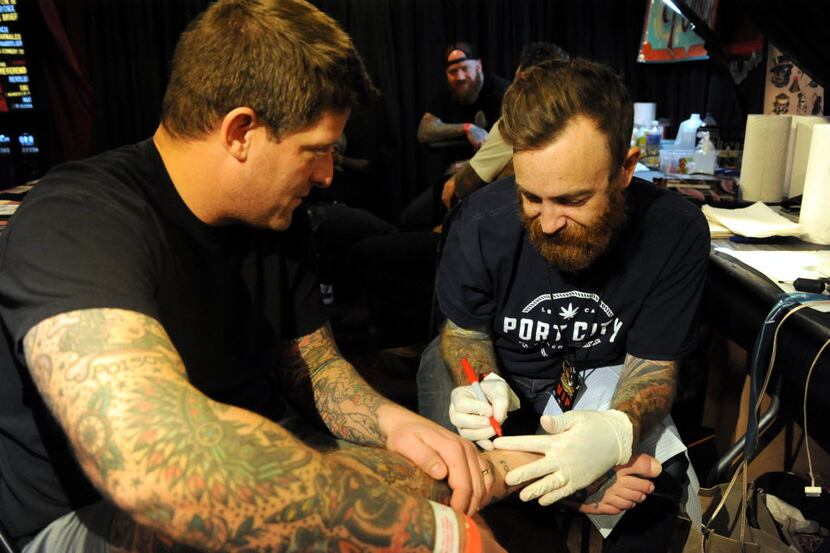 "Get what you get" tattoos are done on a walk-in basis. After the design is selected, the...