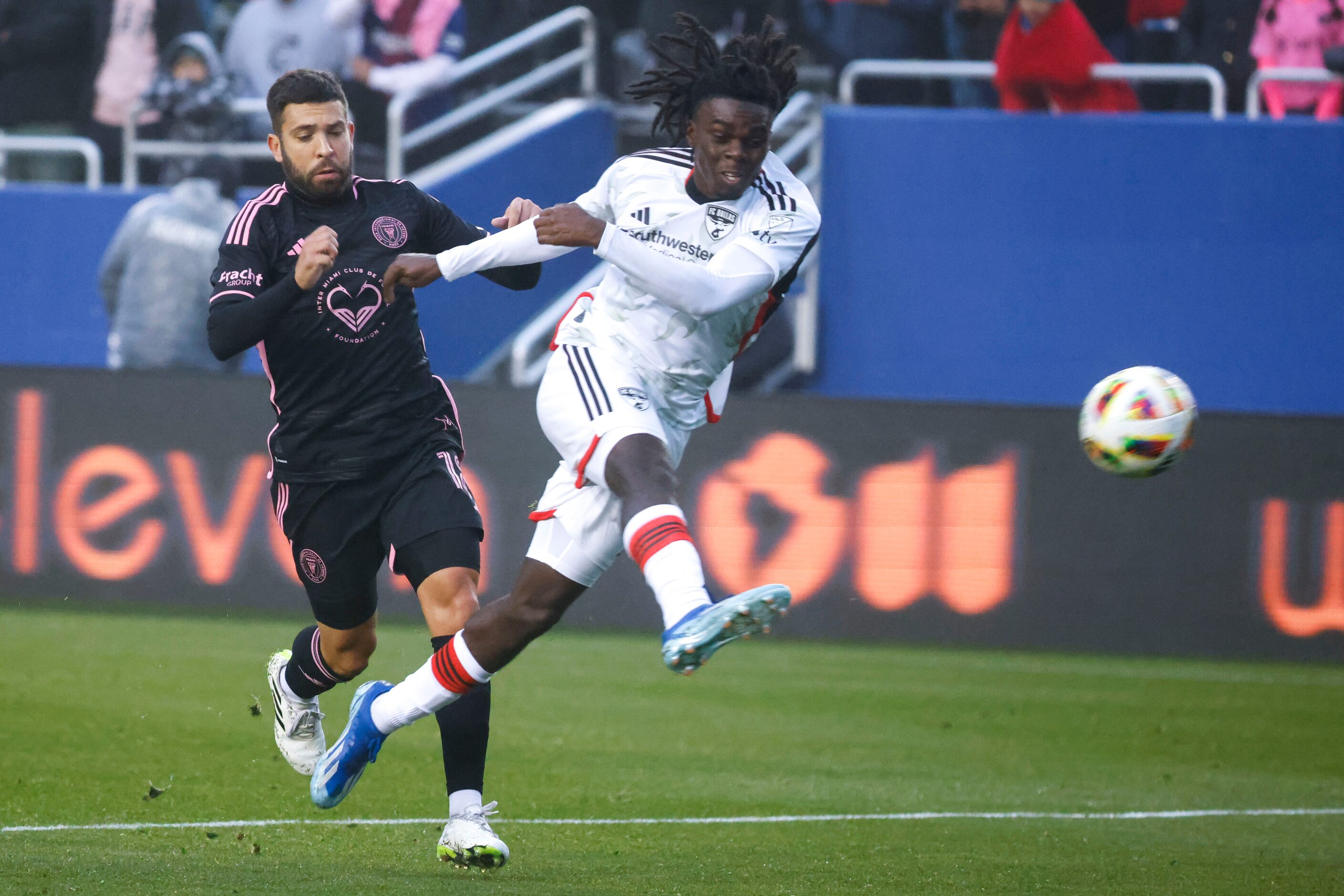 FC Dallas forward Herbert Endeley (right) kicks away the ball for corner against Inter Miami...