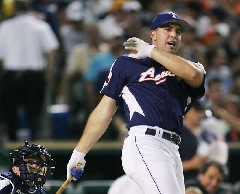 DETROIT - JULY 11: American League All-Star Mark Teixeira #23 of the Texas Rangers attempts...