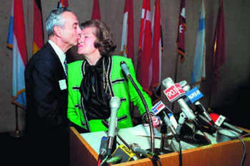 Dallas Mayor Annette Strauss got a kiss from husband Ted when she announced plans to seek...