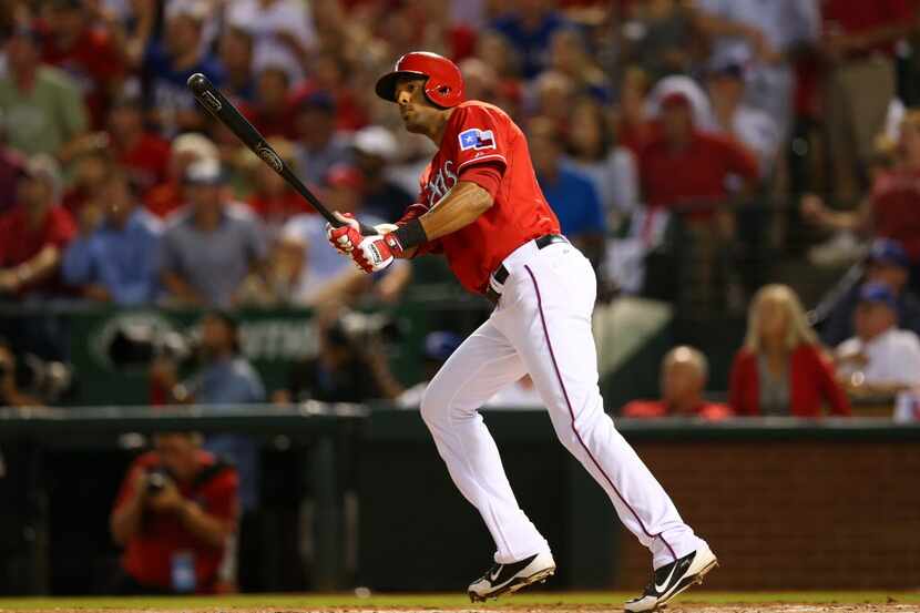 ARLINGTON, TX - SEPTEMBER 30:  Alex Rios #51 of the Texas Rangers hits a sixth inning double...