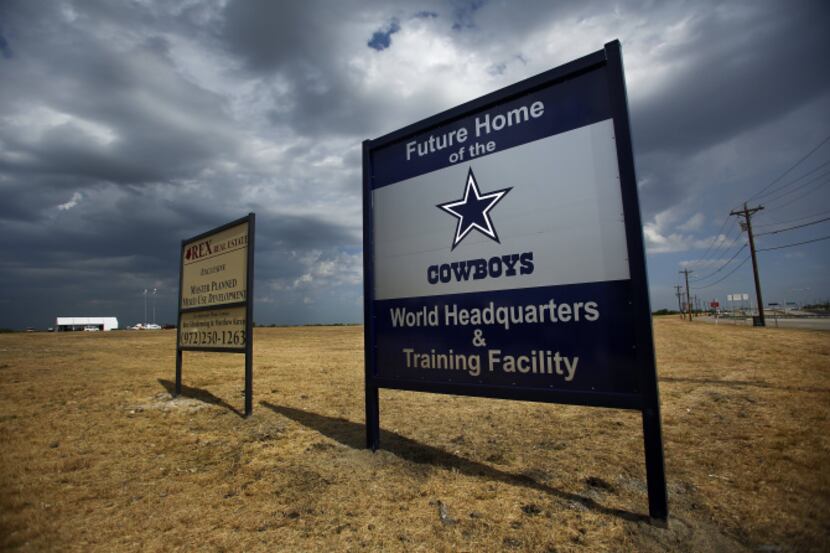 A sign announcing the future home of the Dallas Cowboys headquarters at Warren Parkway and...