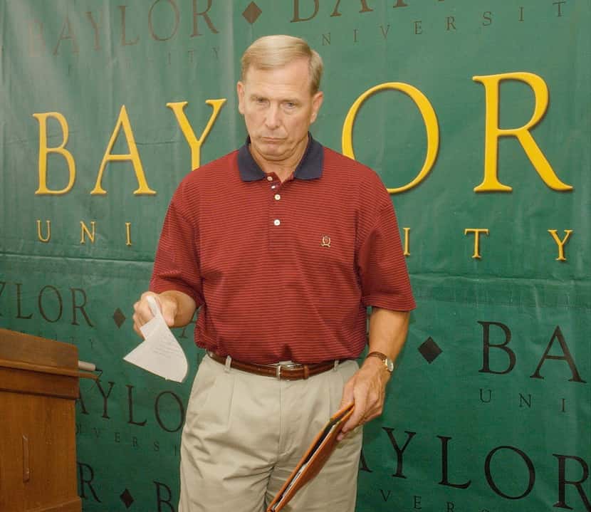 In this file photo, former Baylor basketball coach Dave Bliss collects his notes after...
