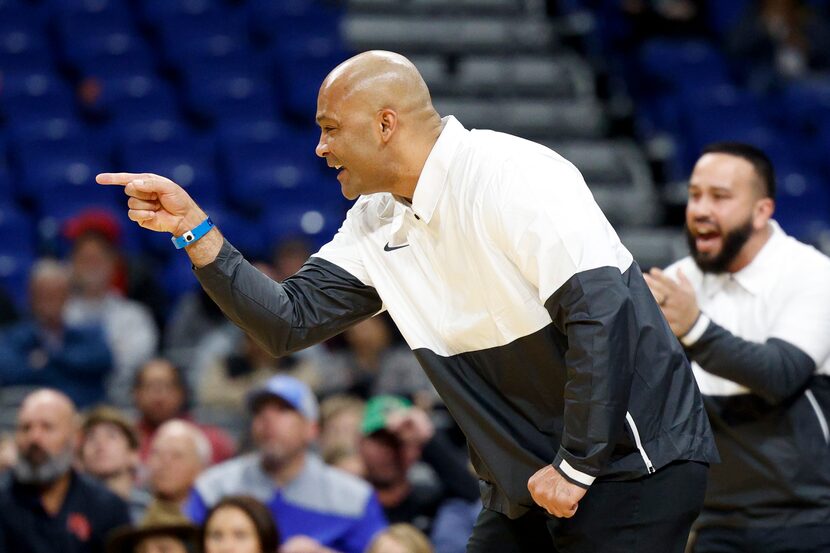 Duncanville head coach David Peavy talks to his team during the second quarter of the Class...