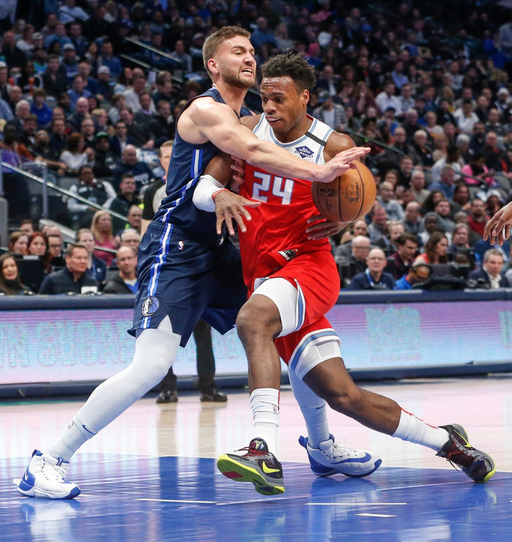 Dallas Mavericks forward Maxi Kleber (42) puts a stop to Sacramento Kings guard Buddy Hield...