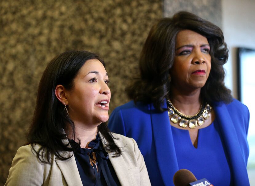 Cynthia Garza (left), chief of Dallas County's conviction-integrity unit, speaks to the...