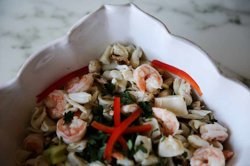 Fruitti di mare, or seafood salad, is photographed in preparation of a traditional Italian...