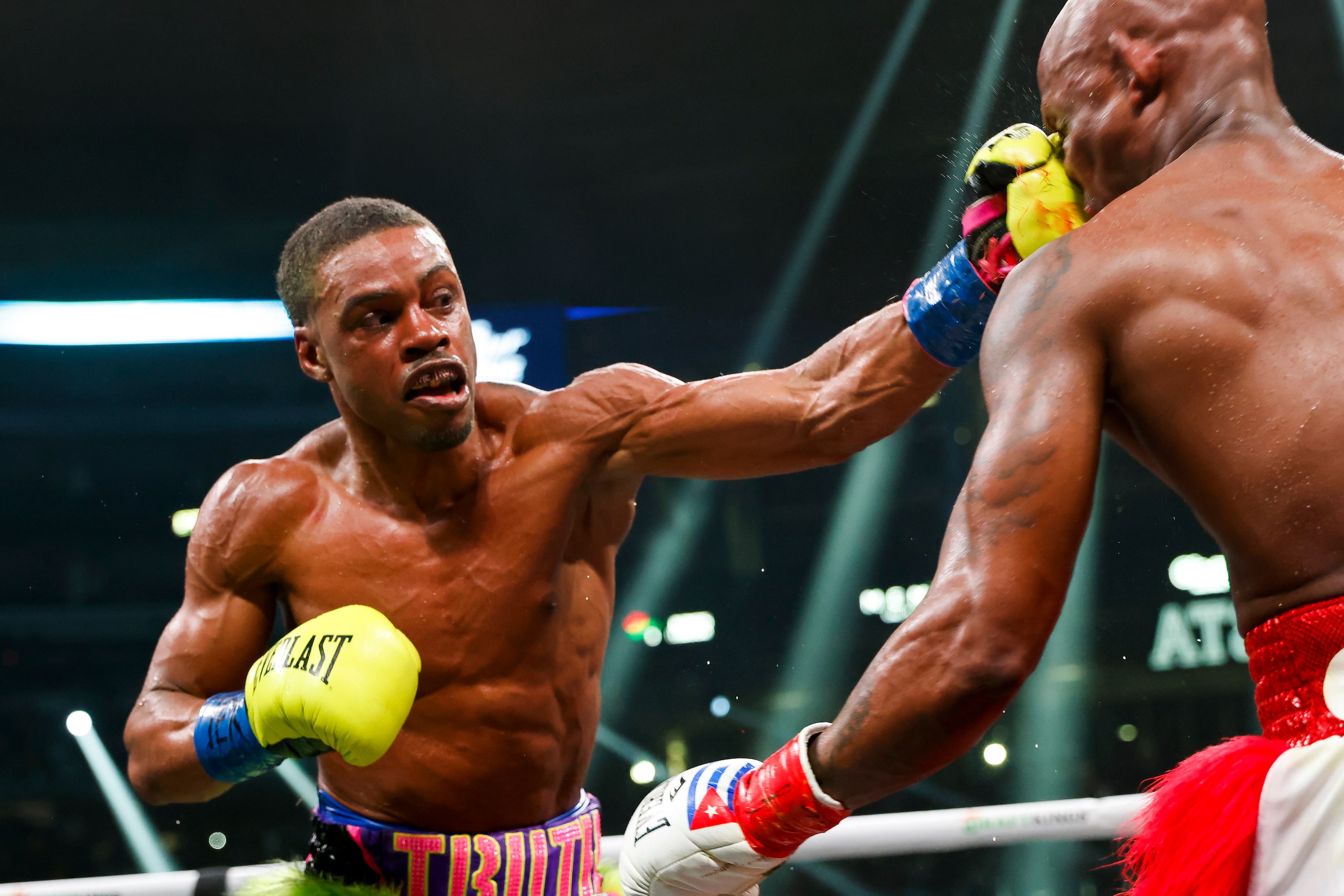 DeSoto’s Errol Spence Jr. hits Yordenis Ugas during a welterweight championship boxing match...