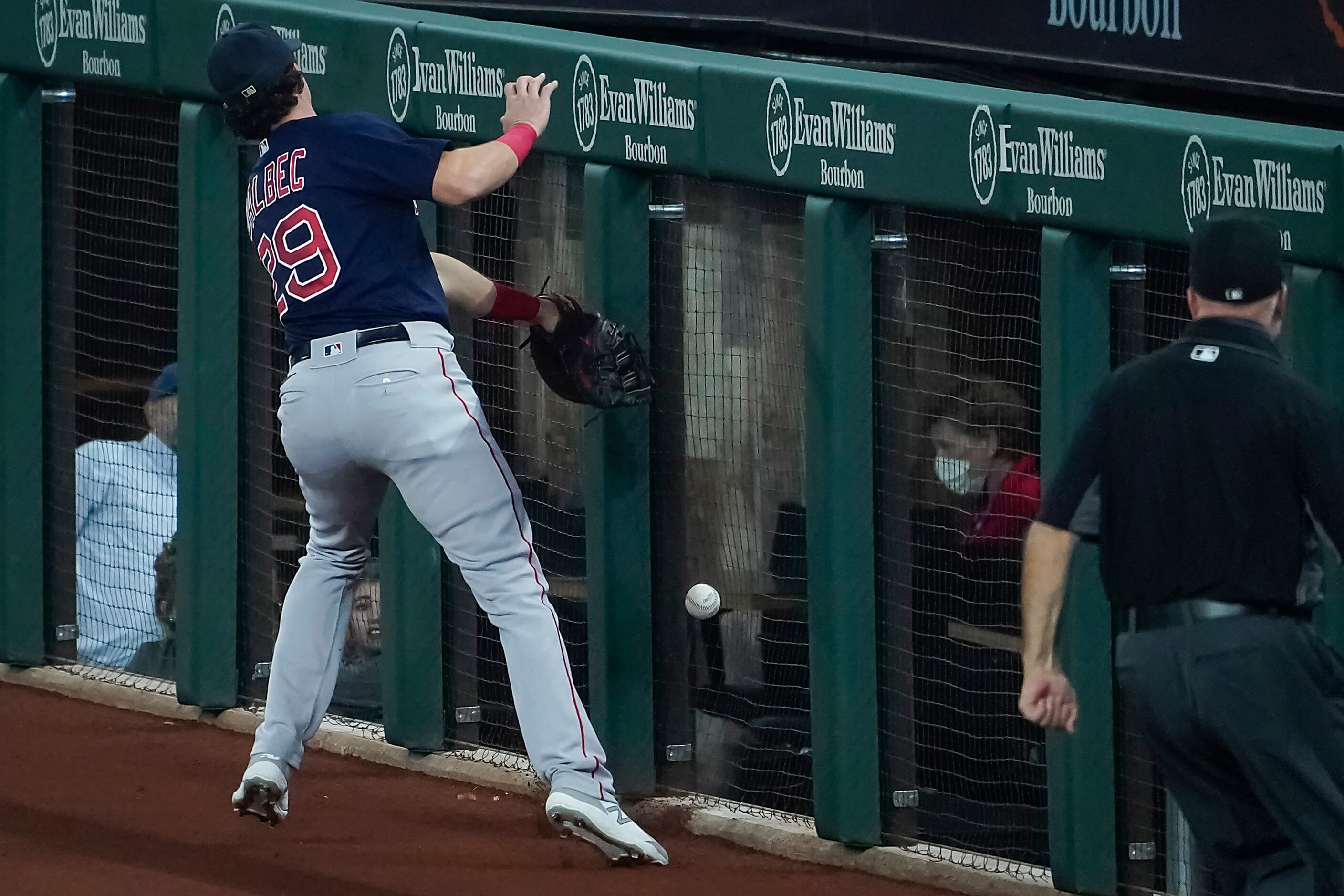 Boston Red Sox first baseman Bobby Dalbec can’t make the play on a foul ball off the bat of...