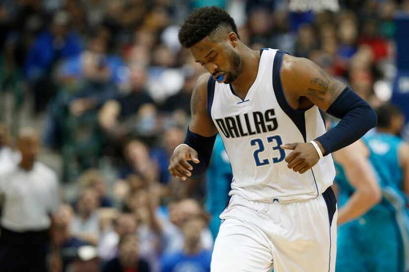 Dallas Mavericks guard Wesley Matthews (23) reacts after a missed shot against the Charlotte...