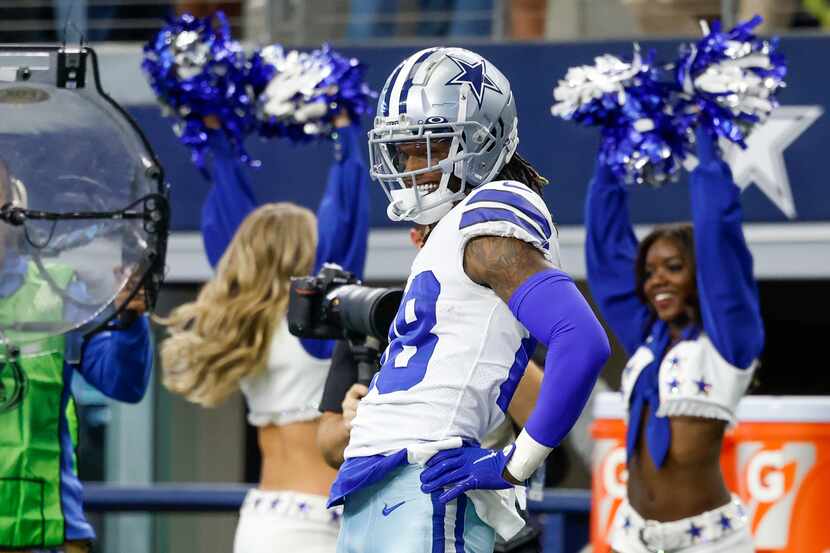Dallas Cowboys wide receiver CeeDee Lamb (88) celebrates in the end zone after scoring a...
