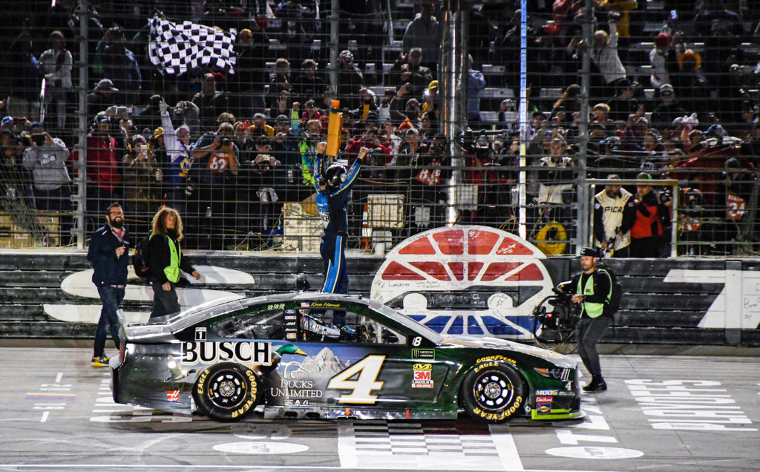Kevin Harvick (4) celebrates after winning a NASCAR Cup Series auto race at Texas Motor...