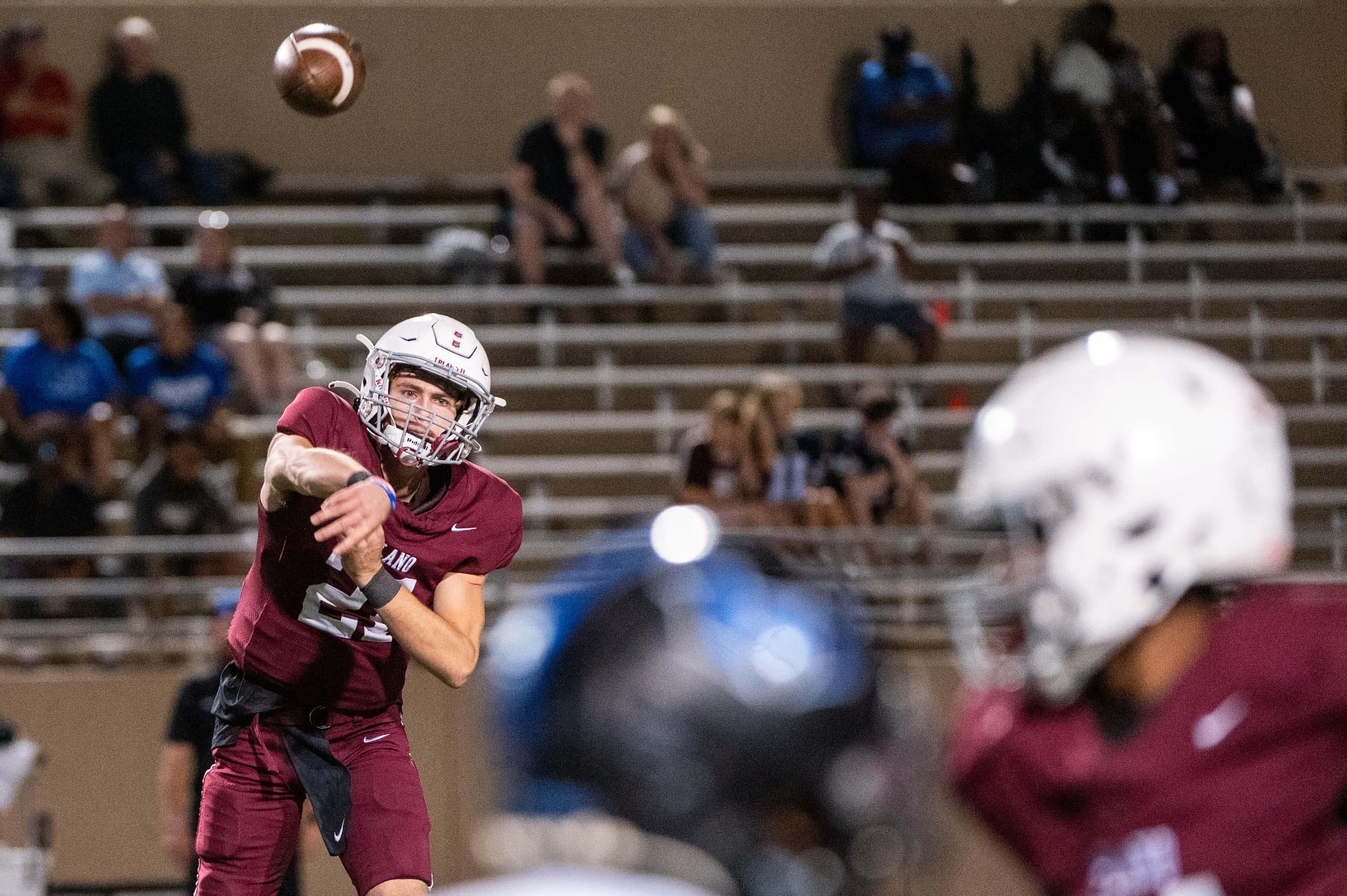 Plano’s Jack Thomason (21) throws a pass in the first half during a high school football...