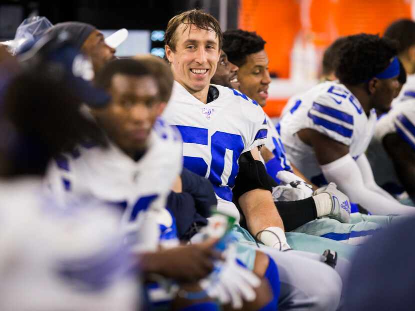 FILE - Cowboys outside linebacker Sean Lee (50) smiles on the sideline during the fourth...