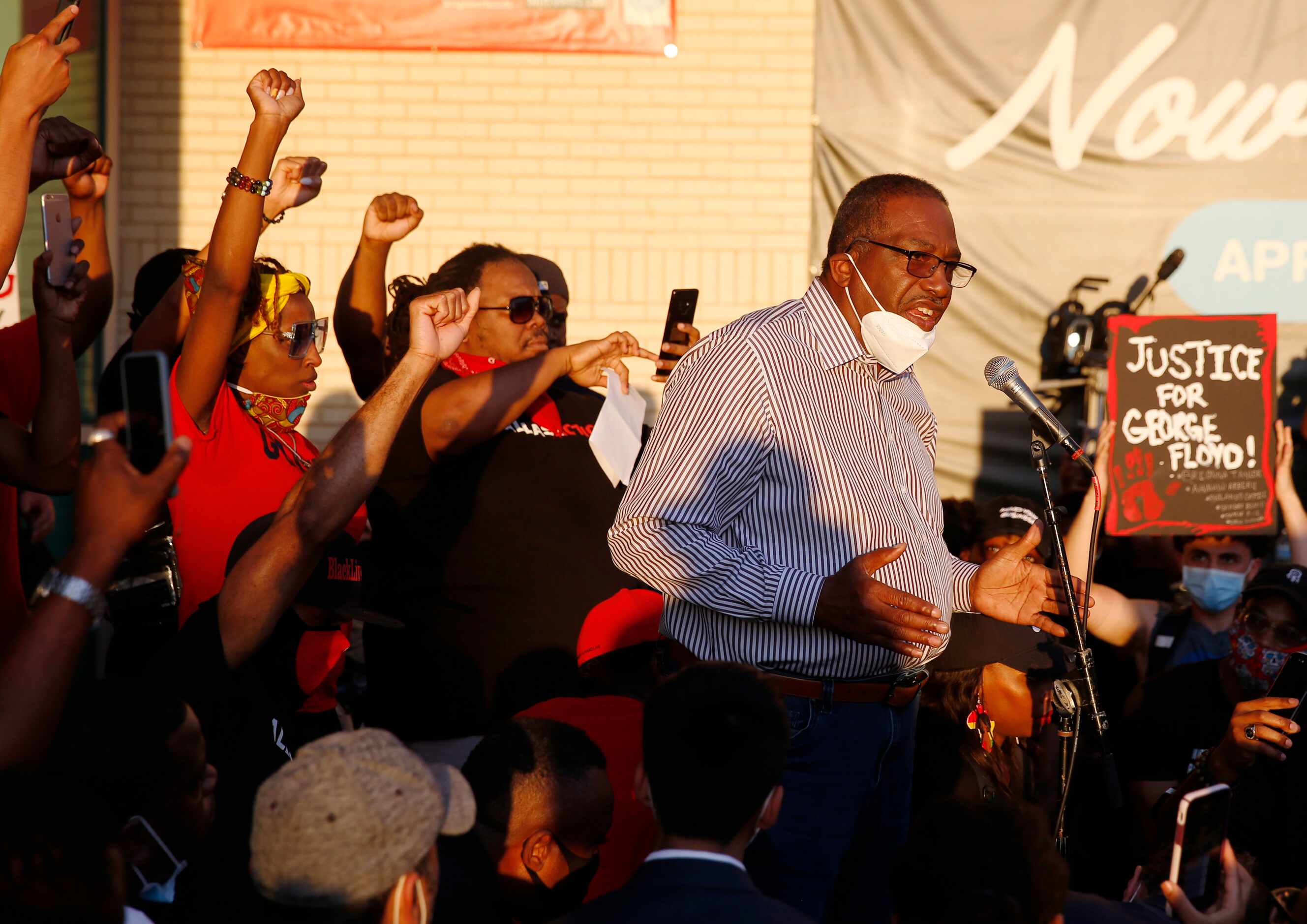 Texas Senator Royce West speaks to protesters during a demonstration against police...
