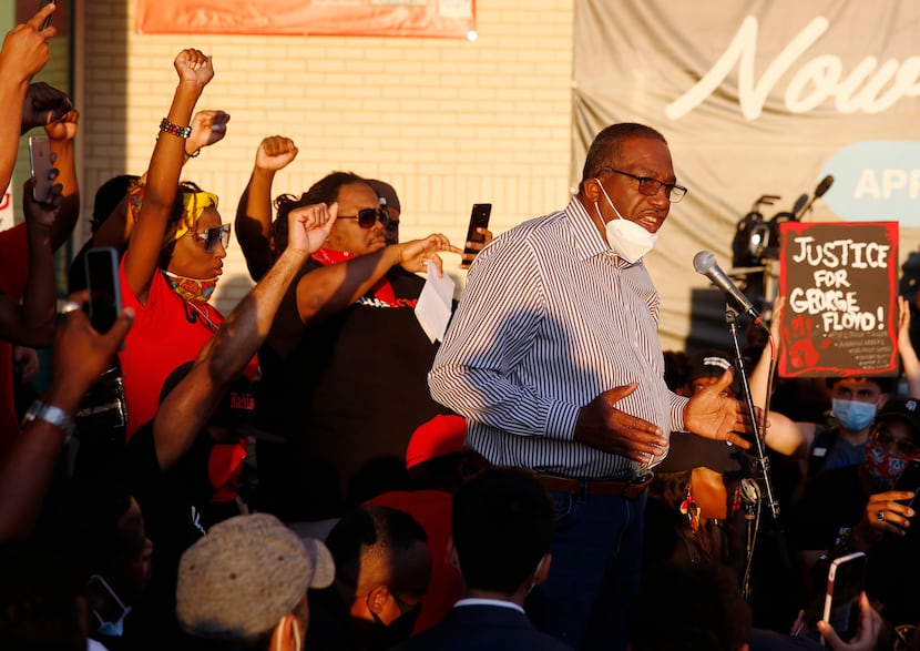 Texas state Sen. Royce West speaks to protesters during a demonstration against police...
