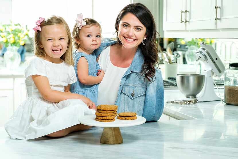 Whitney Rowell with her daughters Stella, 3, and Charlotte, 1, and a plate of her Miracle...