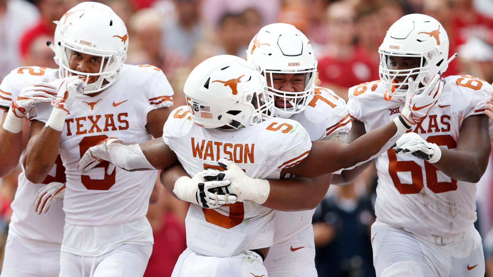 Texas Longhorns running back Tre Watson (5) celebrates with Texas Longhorns offensive...