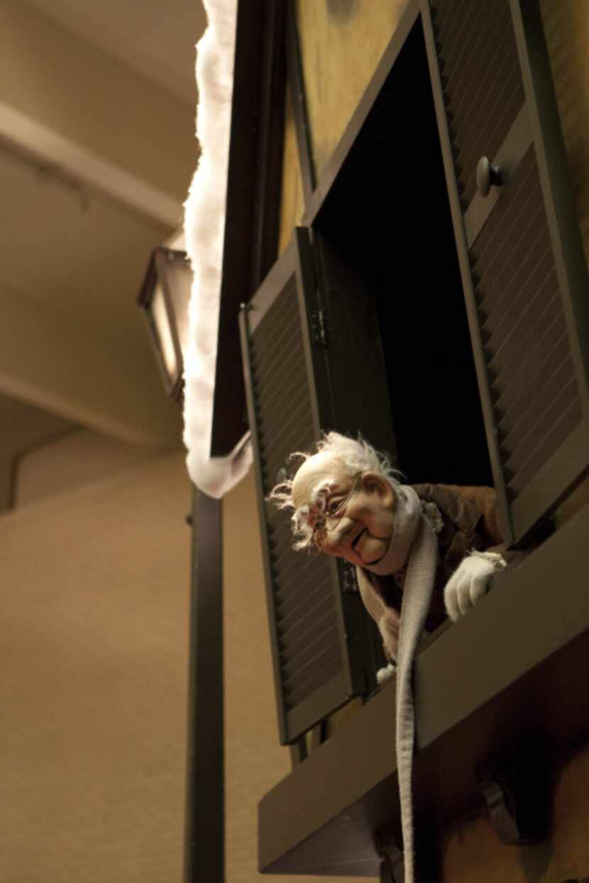 At Scrooge Puppet Theatre at NorthPark Center, puppeteer John Hardman gives all visitors a...