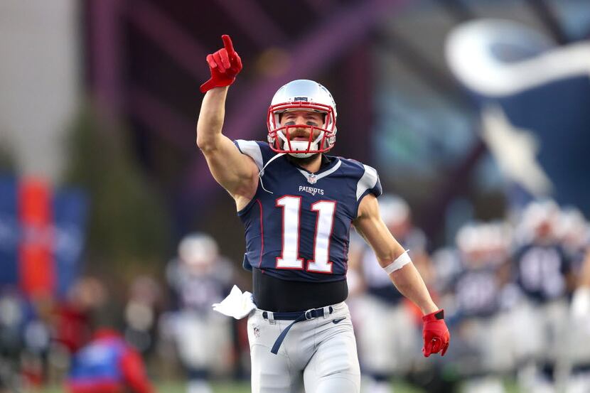 FOXBORO, MA - JANUARY 16:  Julian Edelman #11 of the New England Patriots takes the field...