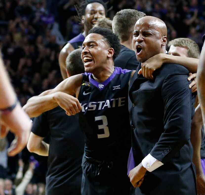Kansas State's Kamau Stokes (3) celebrates with assistant coach Chester Frazier after a...