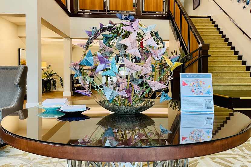 A display of origami butterflies greets visitors at Presbyterian Village North. The...