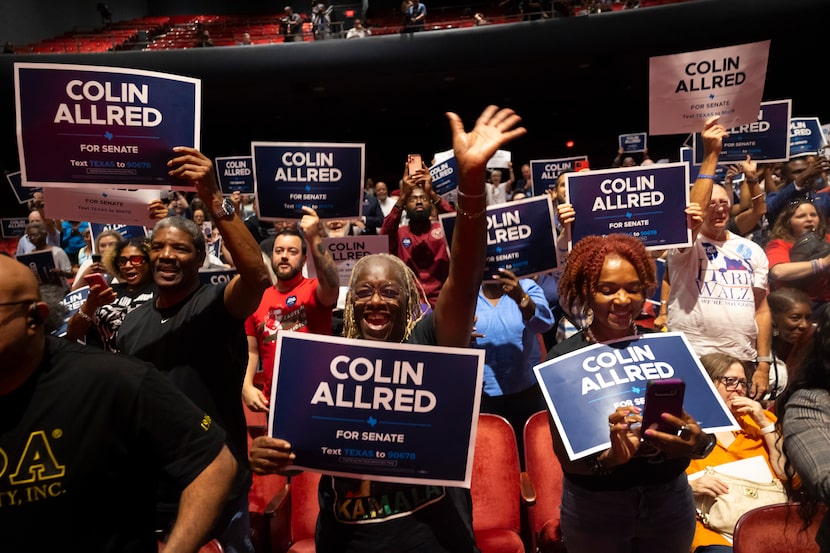 Berteal Binion and Linda Terry cheer as Rep. Colin Allred, D-Texas, takes the stage during a...