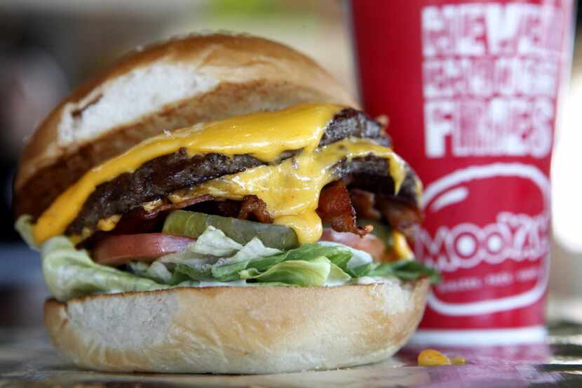 A Bacon Cheeseburger is pictured at Mooyah at Legacy and Independence Parkway in Plano, on...