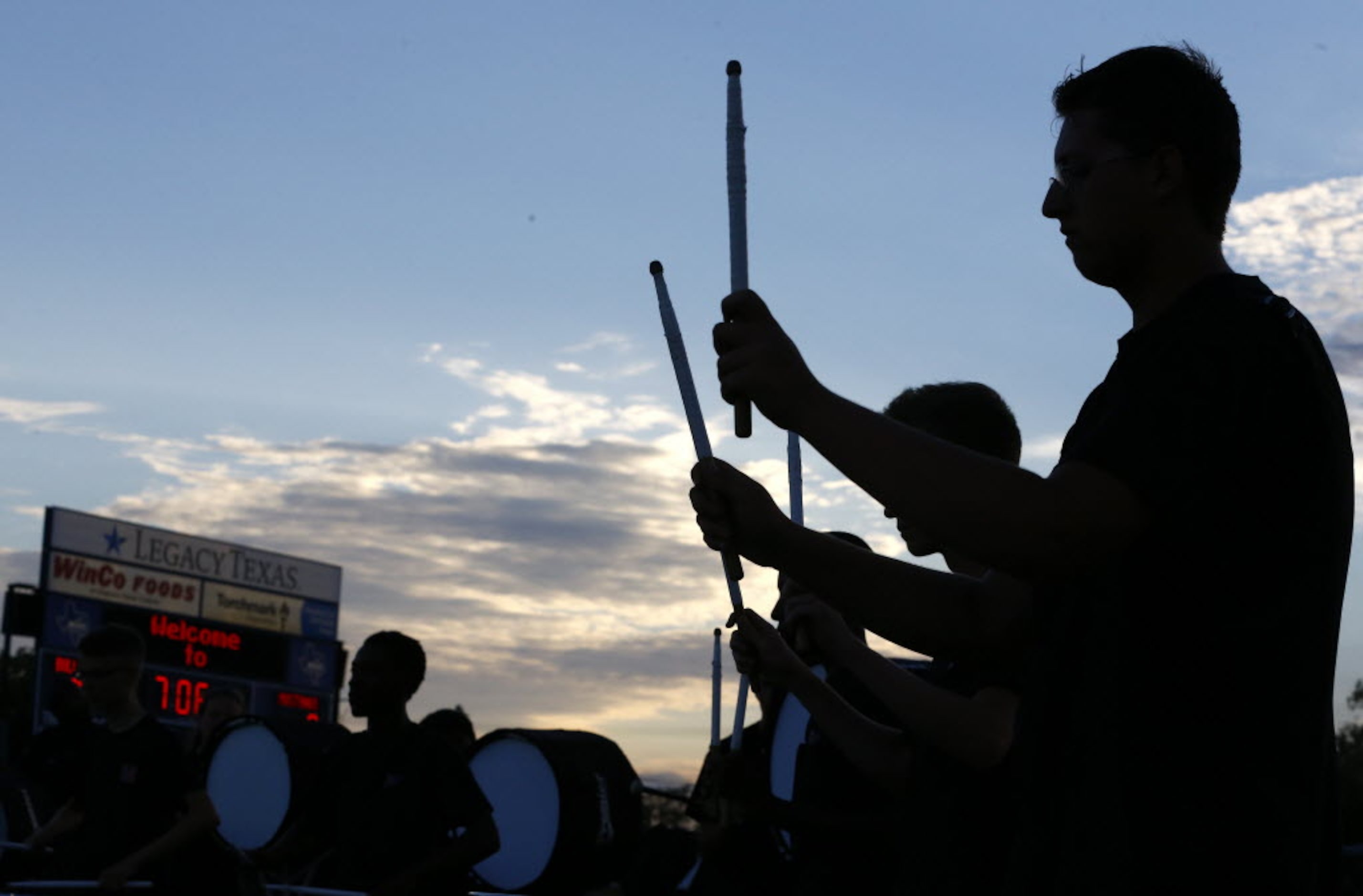 TXHSFB The McKinney North band gets warmed up before their high school football game against...